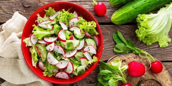 Green salad, radishes and cucumbers
