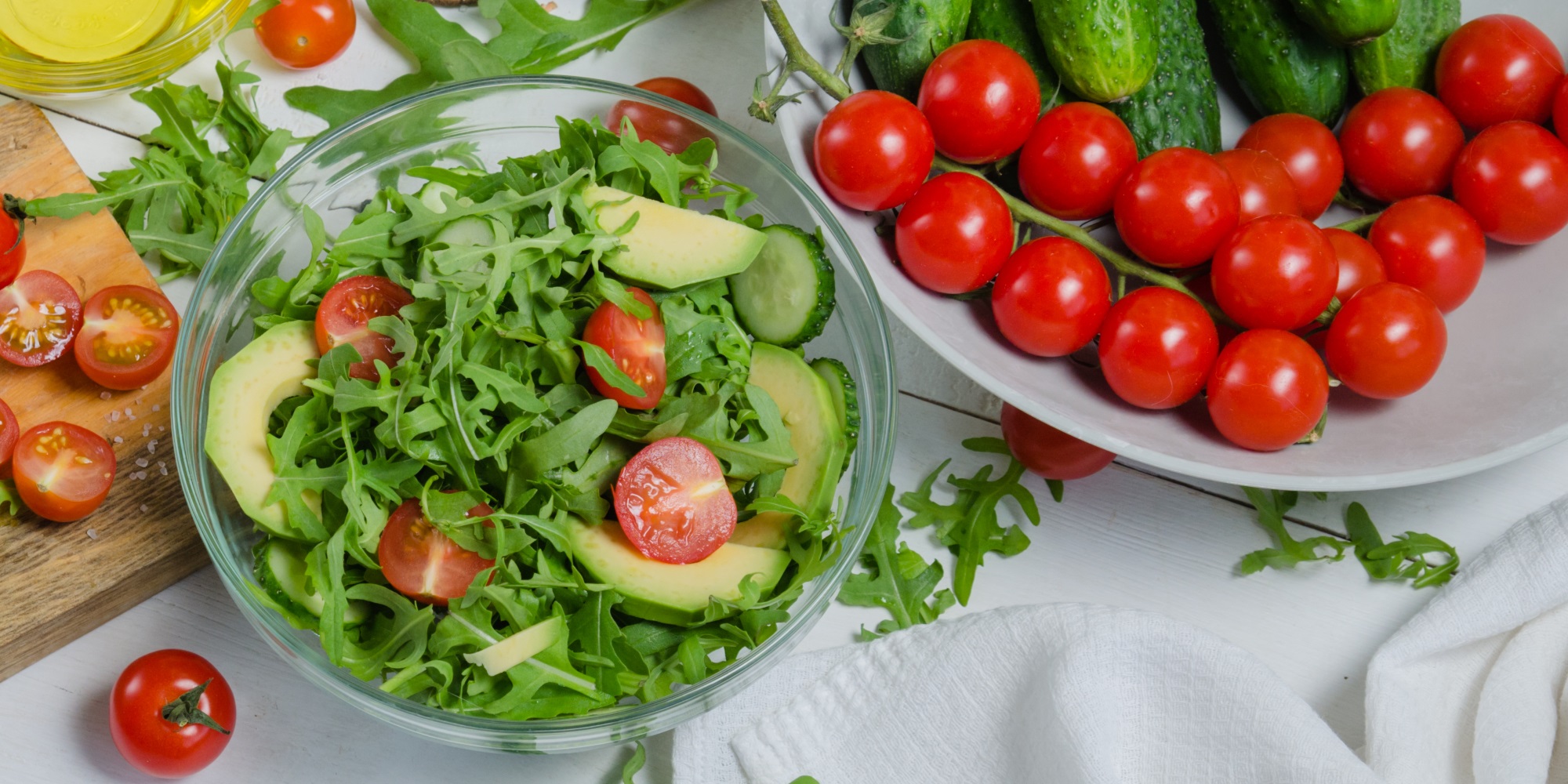 Iceberg lettuce, cherry tomatoes, avocado and cucumbers