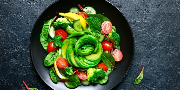 Avocado, cucumbers, cherry tomatoes, chard leaves and broccoli