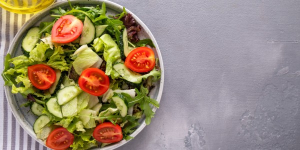 Green salad, cherry tomatoes and cucumbers