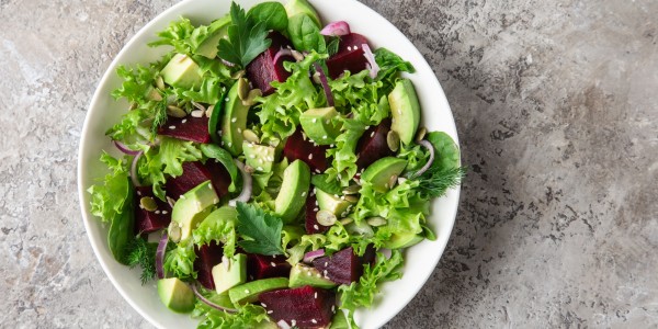 Avocado, lettuce, baby spinach, red beets and sesame seeds