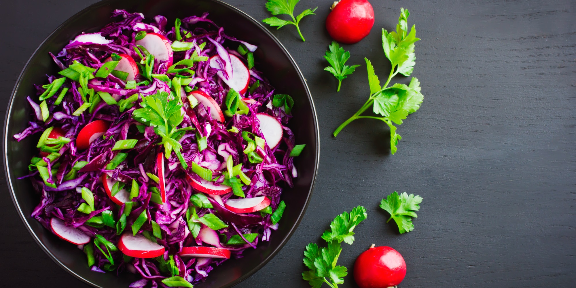 Red cabbage, radishes and spring onion