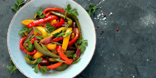 Roasted yellow, green and red bell peppers and parsley