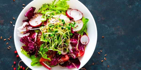 Tomatoes, lettuce, peppers, radishes, green sprouts and flax seeds