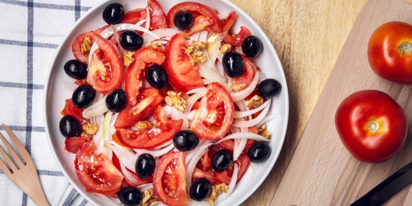 Tomatoes, onion, black olives and walnuts